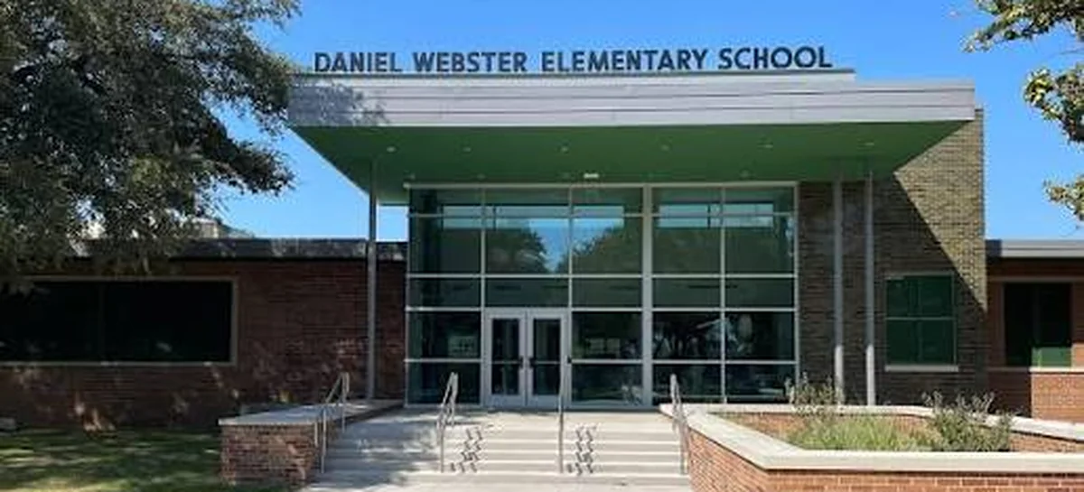 The entrance to Daniel Webster Elementary School, the school name above the doors.